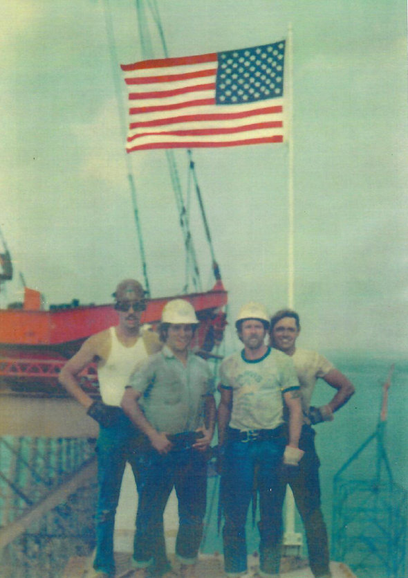 Young Black Man/Soldier holding hat over heart